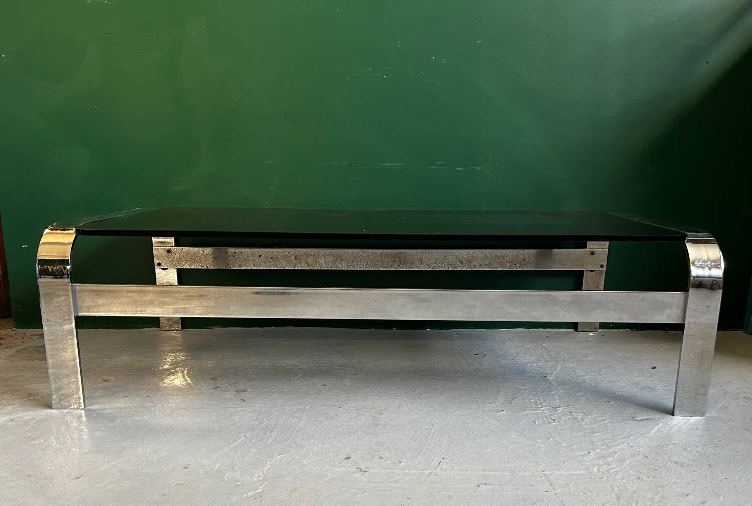 Coffee table in chromed metal and smoked glass