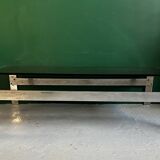 Coffee table in chromed metal and smoked glass