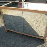 Small vintage buffet of commerce surrounded by mirrors