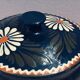 Alsatian pottery soup decorated with white flowers and green arabesques motifs