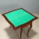 Game table in Indian rosewood and mahogany