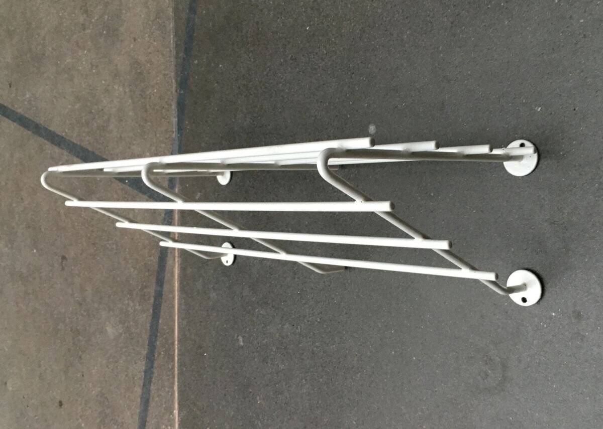 Mid-century modern minimalist metal coat rack from the 1960s.