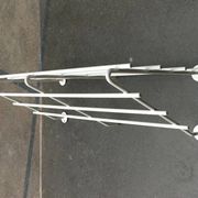 Mid-century modern minimalist metal coat rack from the 1960s.
