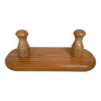 Small wooden coat rack with two hooks