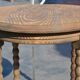 old small round oak table with caned legs