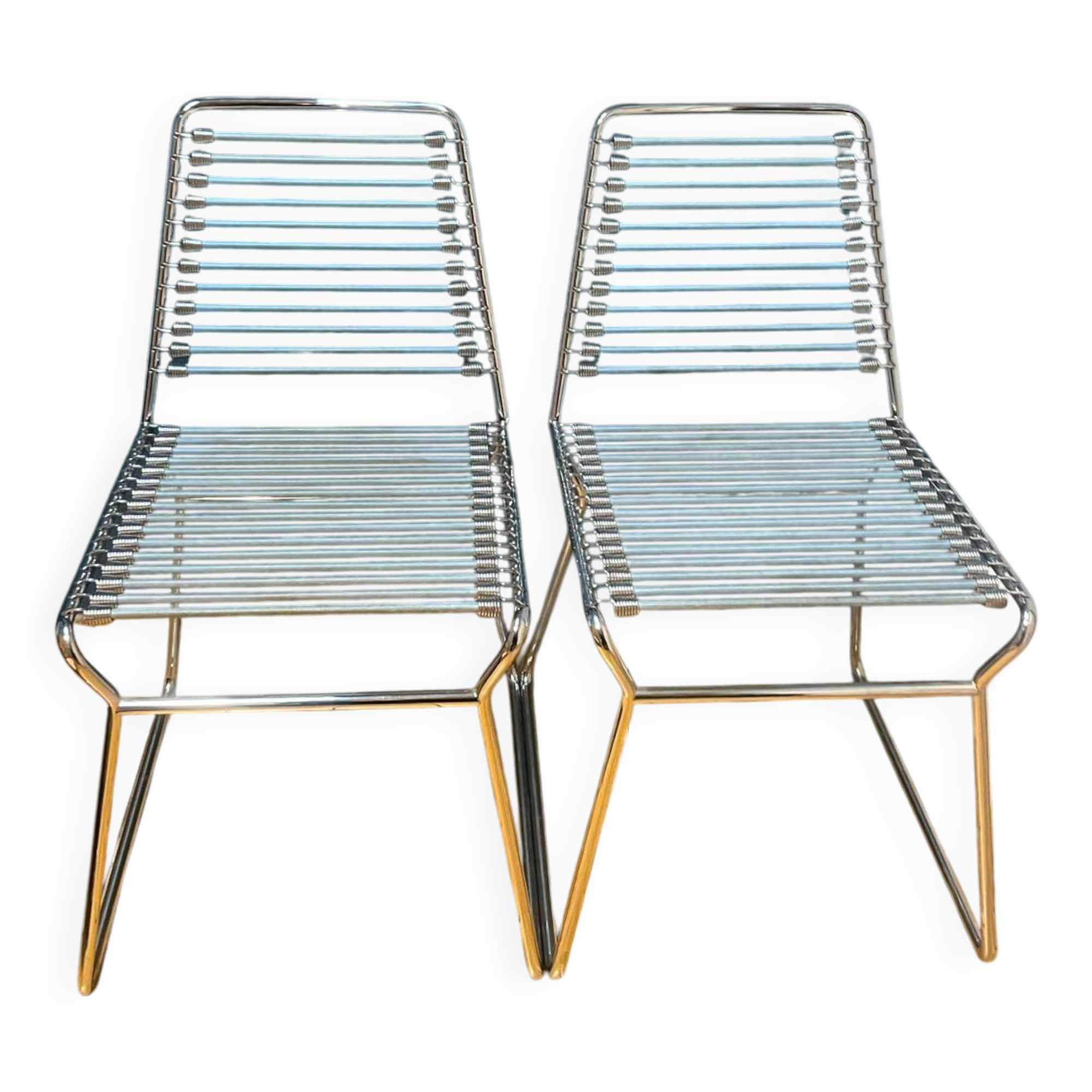 2 metal chairs with bungee cords