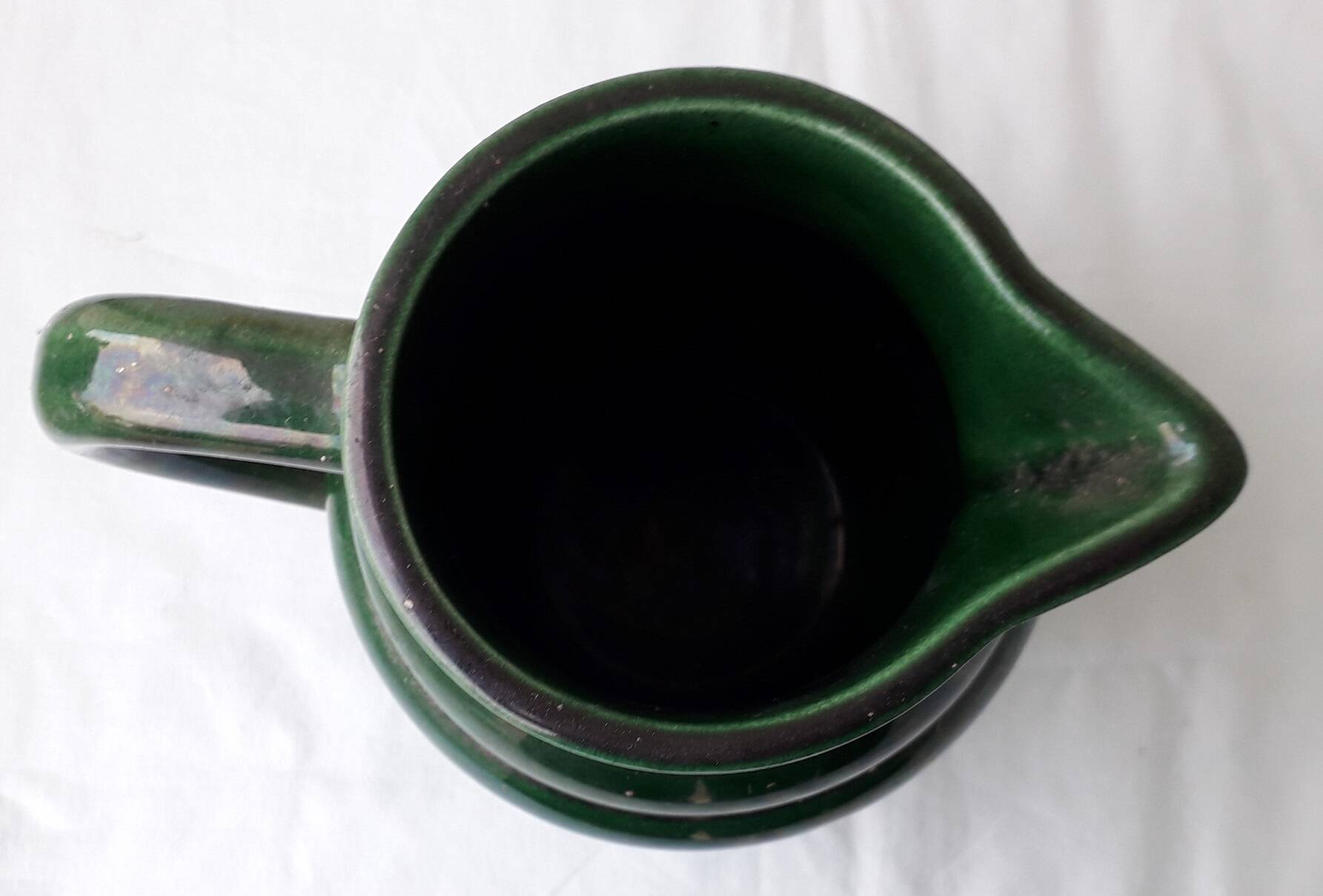 Green ceramic pitcher