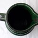 Green ceramic pitcher