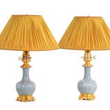 Pair of celadon porcelain and gilt bronze lamps. Circa 1880.
