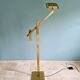 Brass articulated chandelier with counterweight, Hollywood Regency style, 1970-80.