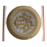 Mosaic tart dish in 24-carat gold by Hermès