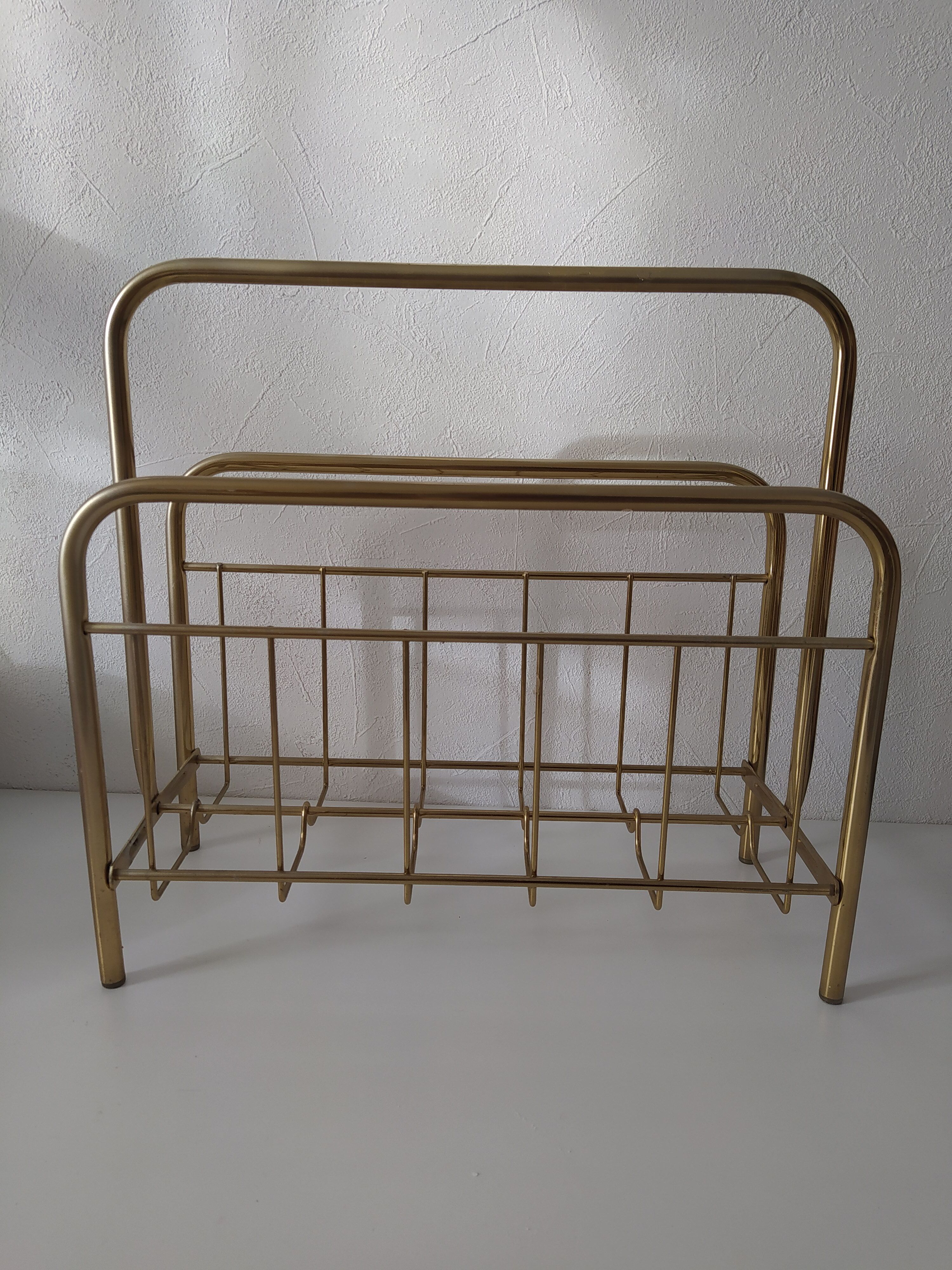 Vintage magazine holder in golden brass