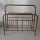 Vintage magazine holder in golden brass