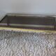 Table basse vintage en verre, laiton et chrome années 70