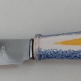 Cup-shaped butter dish with knife