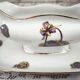 Sauce boat on a Limoges porcelain base with a hydrangea basket design.