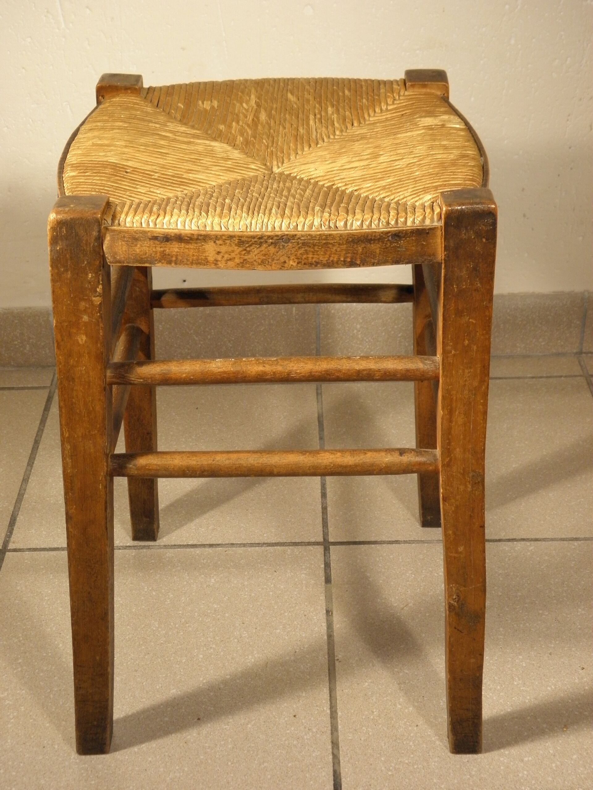 Wood and straw farm stool