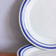 4 assiettes à dessert liseré bleu et un bol assorti