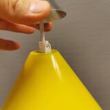 Small cone-shaped lamp in beautiful yellow lacquer finish.