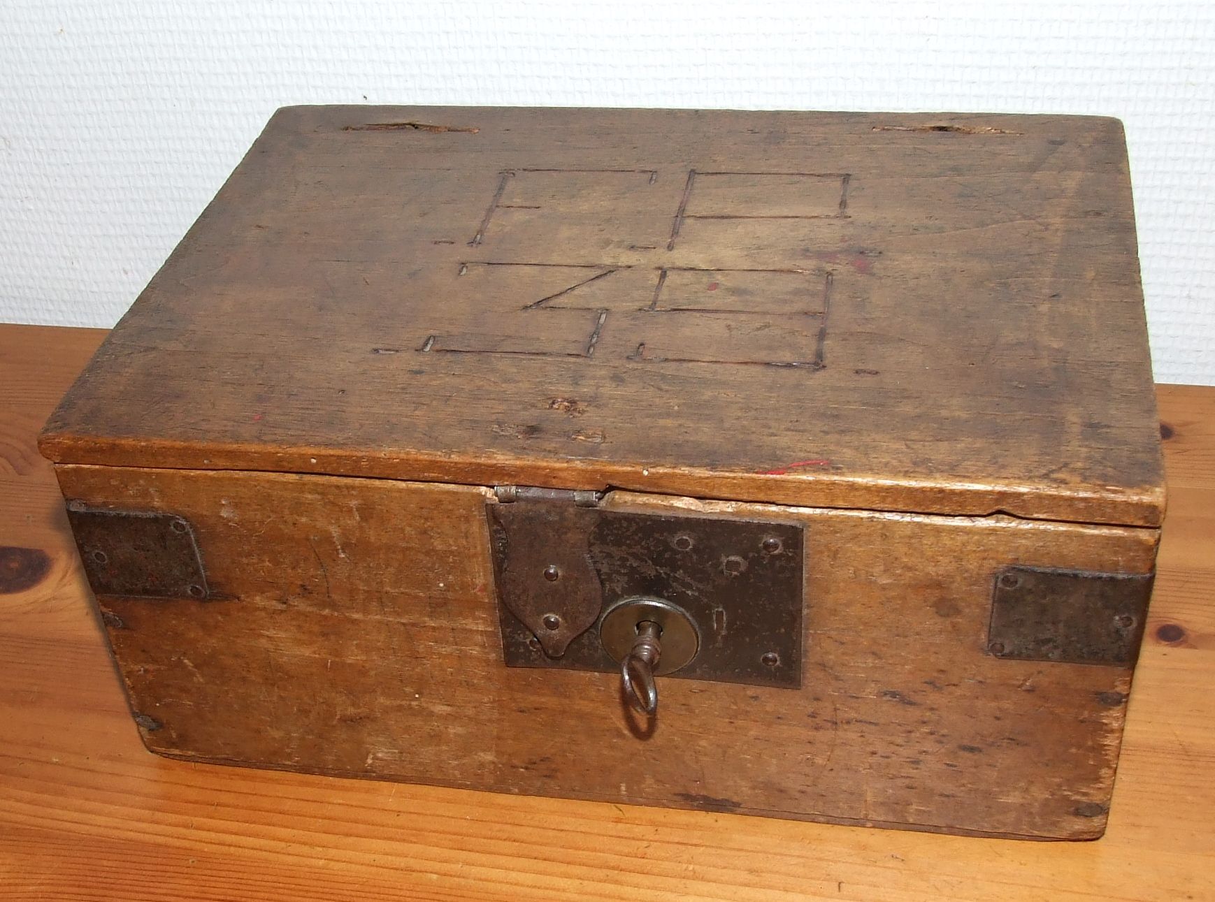 Old box with inscription, fittings, lock and key