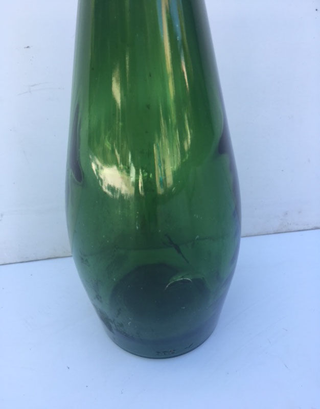 Bottle in glass