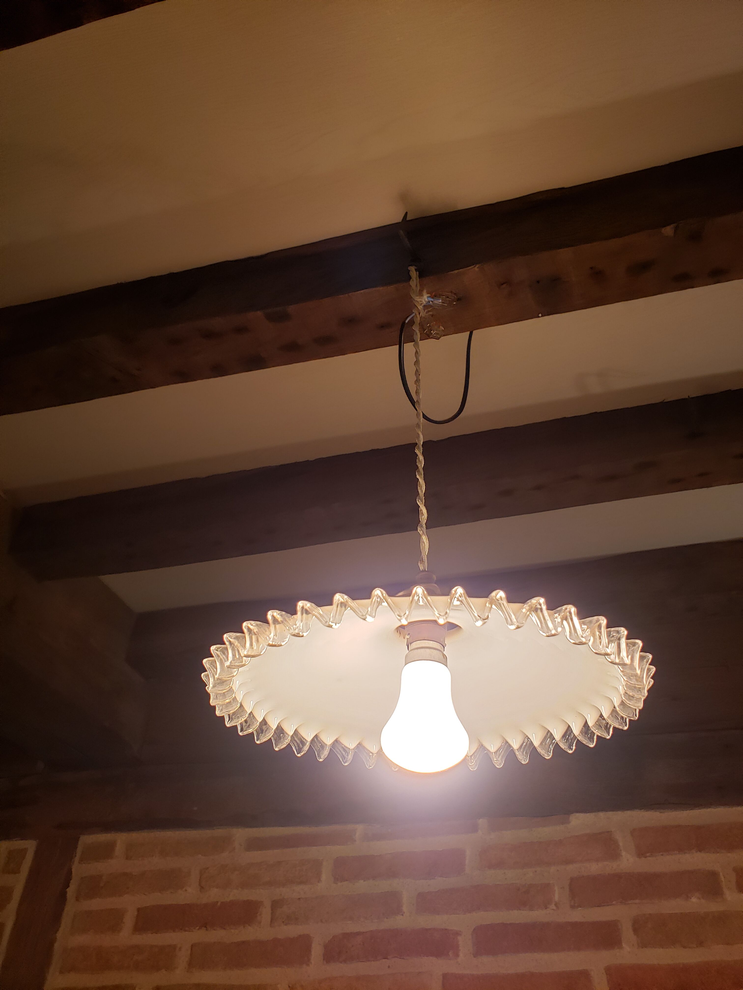 White opaline pendant lamp with serrated edges