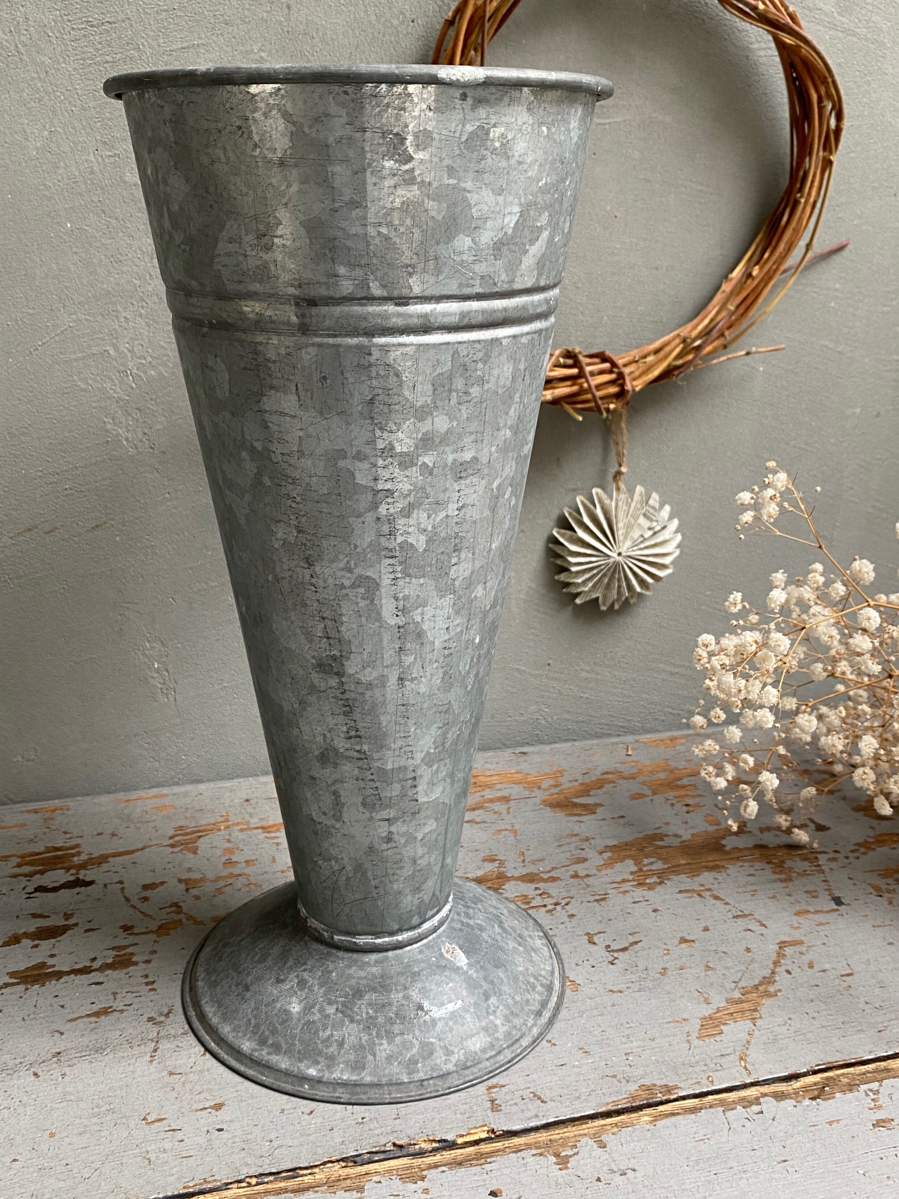 Old zinc florist's vase