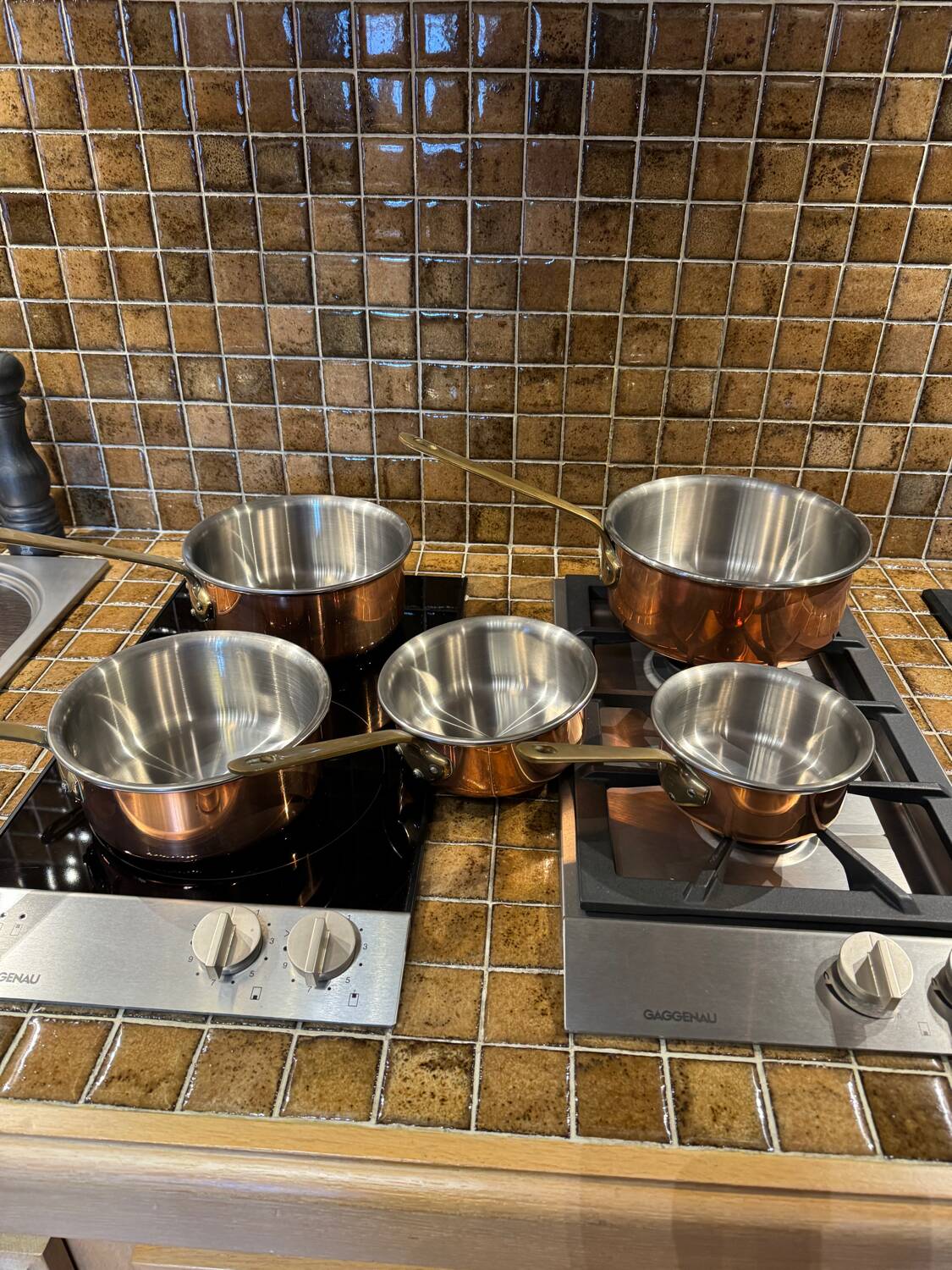 Set of 5 copper saucepans