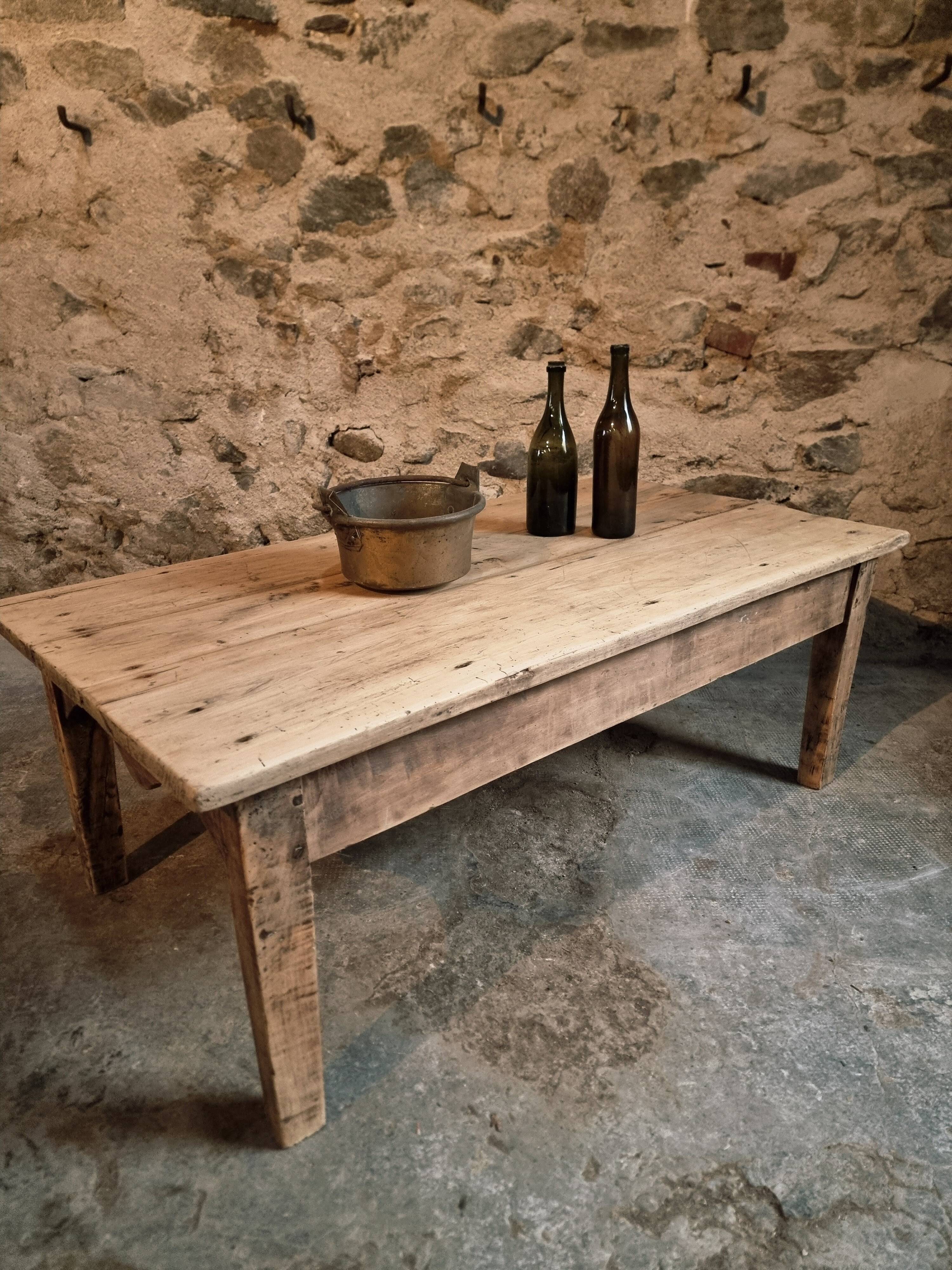 Antique French coffee table in pine with an oak skirt (18th–19th century)