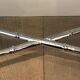 Console and chrome faux-bamboo mirror