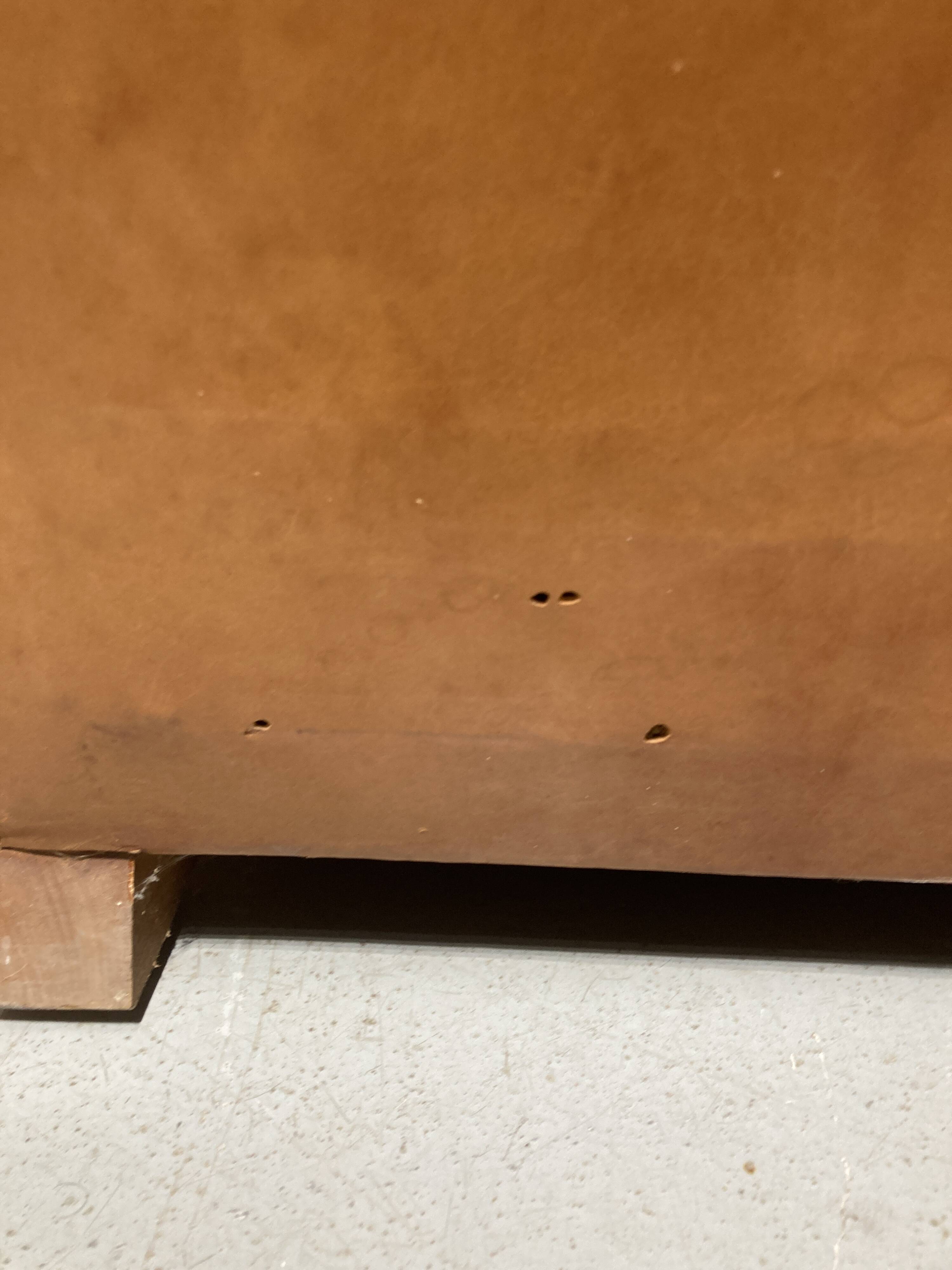 Brown leather armchair