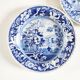 Five 19th century Calais earthenware plates with a romantic gallant couple decor
