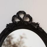 Oval mirror at ribboned knot 112x52cm