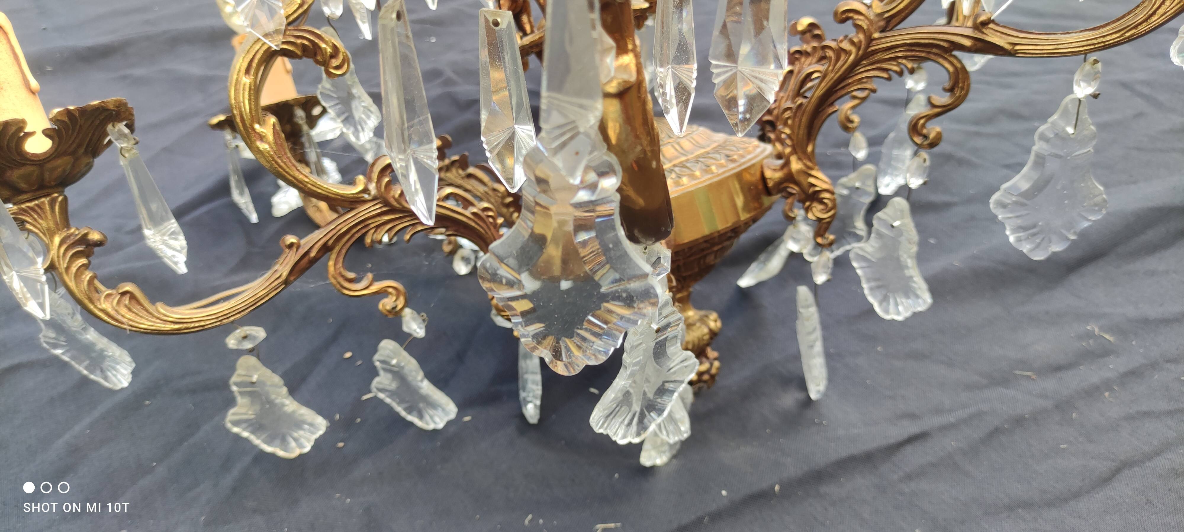 Old bronze chandelier/stamps and angel décor