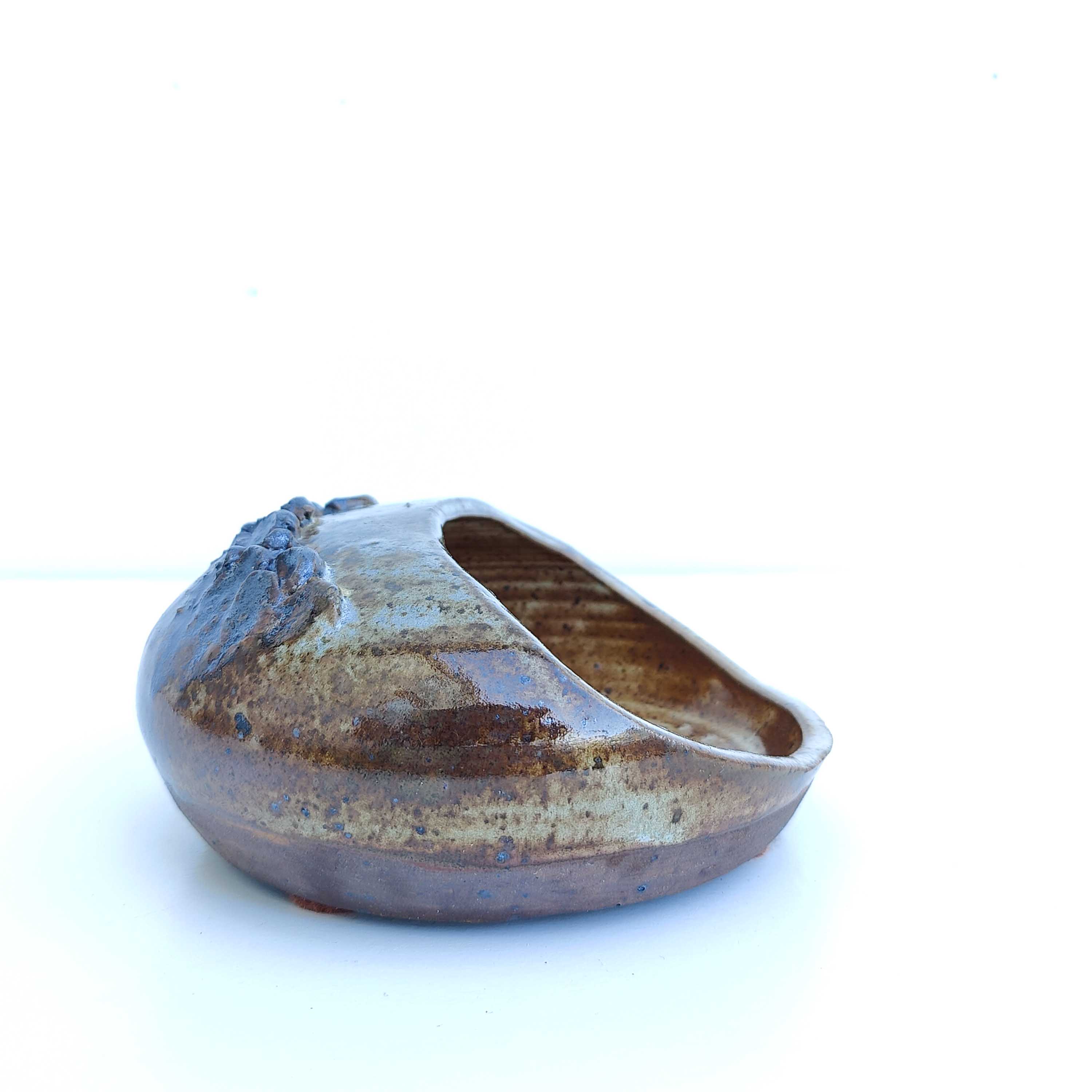 Empty vintage stoneware pocket