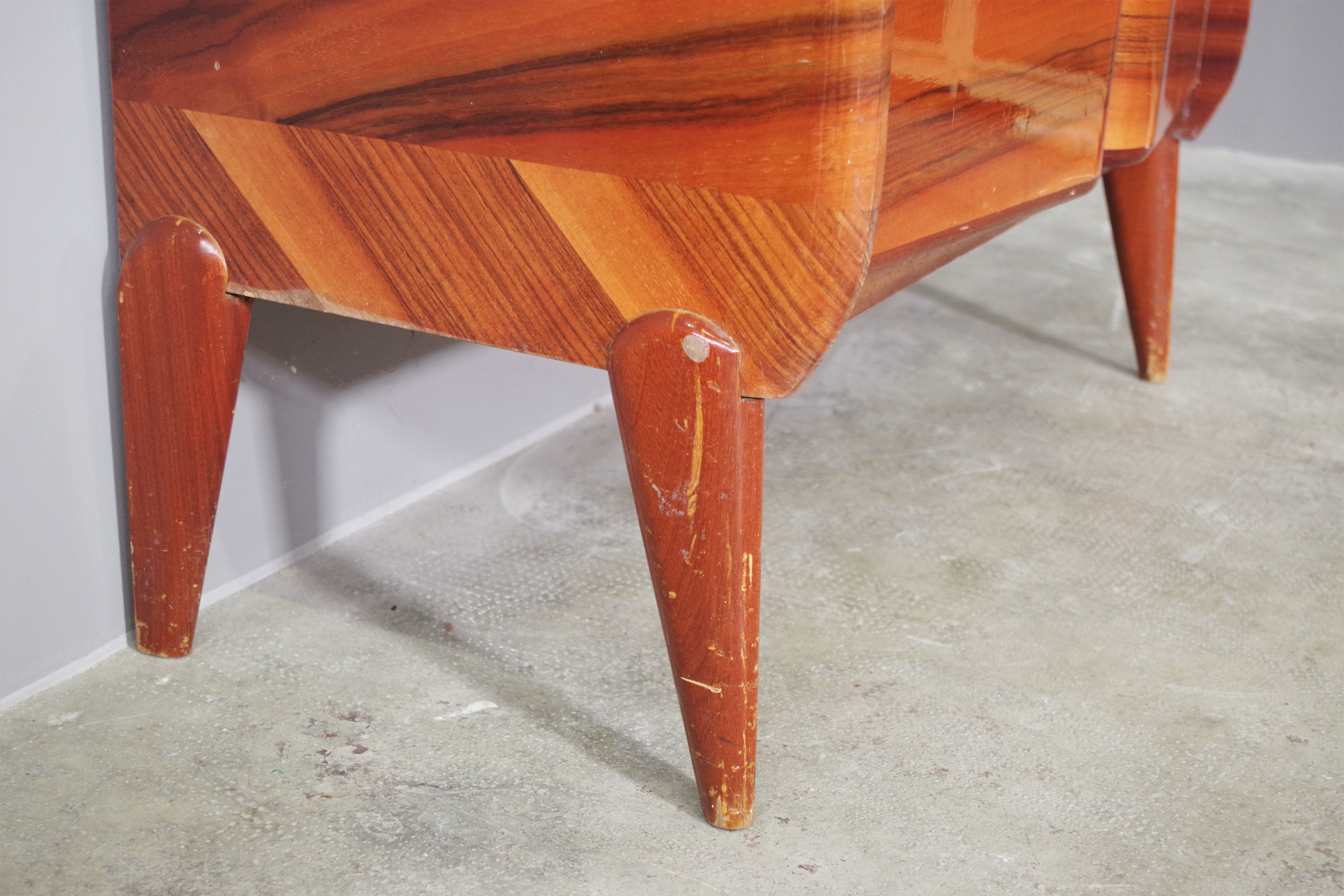 Rounded furniture from the 1950s in cherry veneer