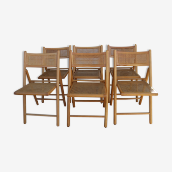 Series of 6 folding chairs canned