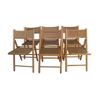 Series of 6 folding chairs canned