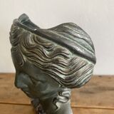 Greek head in patinated plaster with marble base