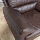 Fauteuil moderne en cuir marron