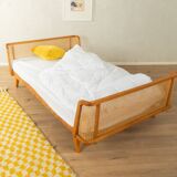 Timeless bed with beech wood and Viennese cane