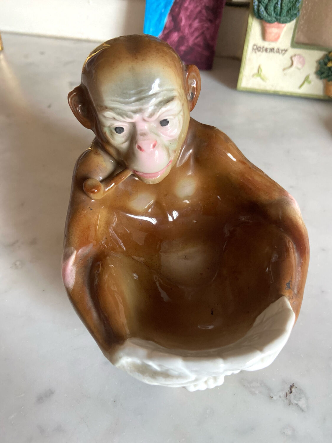 Pipe holder, ashtray or monkey pocket emptier