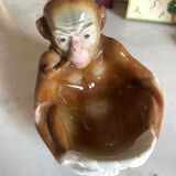 Pipe holder, ashtray or monkey pocket emptier