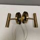 A set of stylish brass wall lamps from Danish Darø