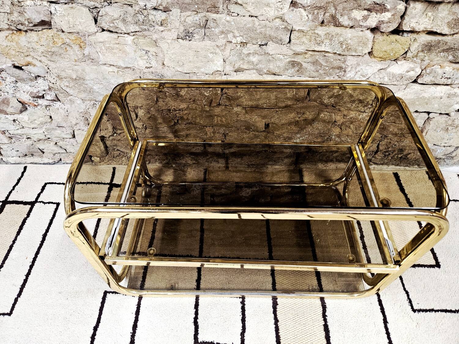 Brass coffee table with sliding top and smoked glass, 1970s vintage