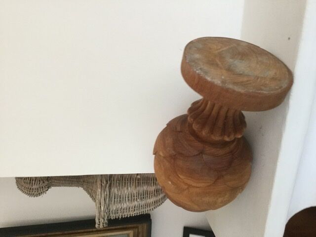 Carved wooden pine cone