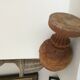 Carved wooden pine cone