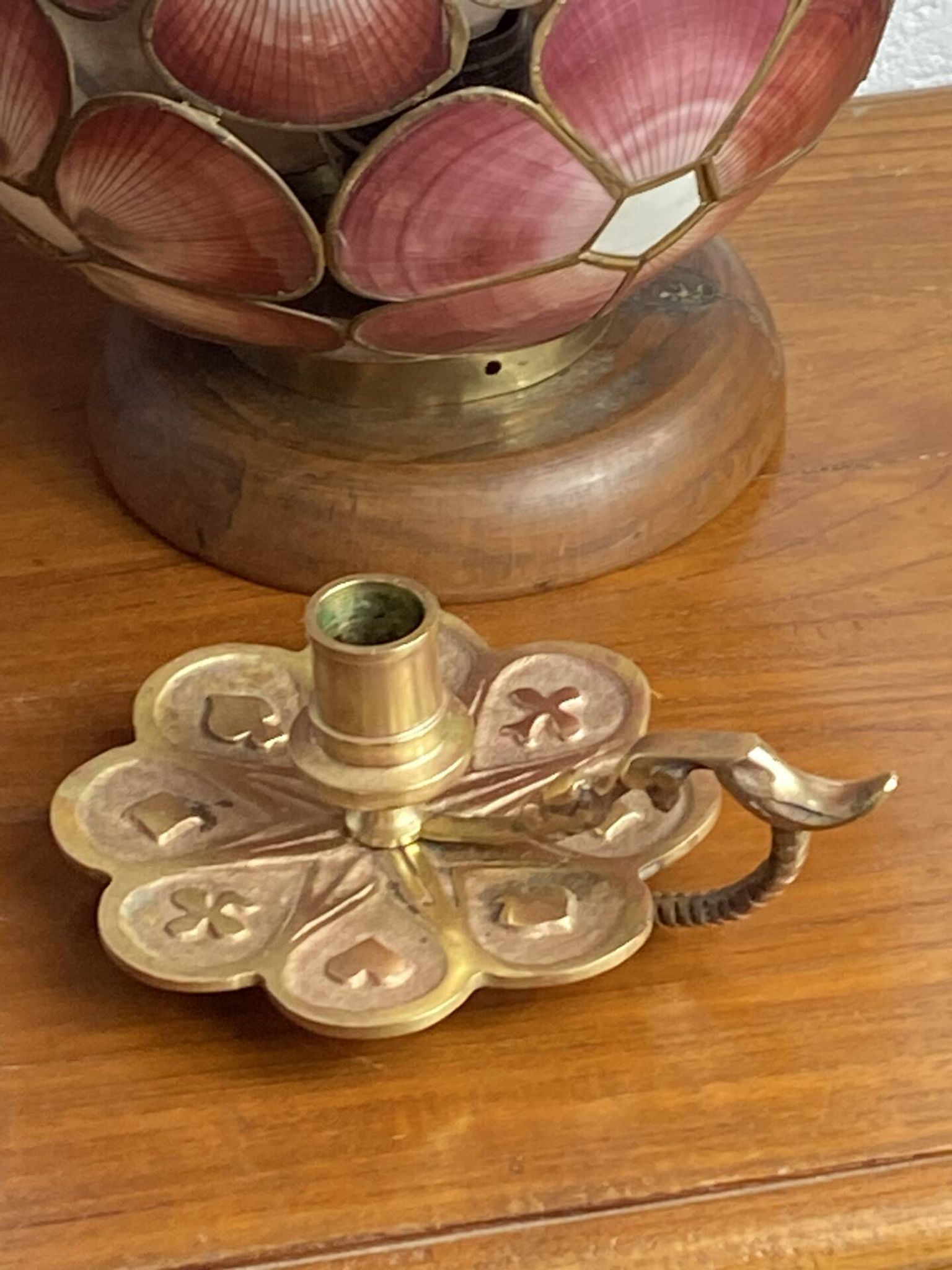 Handheld candlestick in bronze, card game decoration