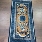 Tapis chinois ancien fait à la main