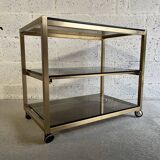 Gold metal and smoked glass serving trolley from the 70s